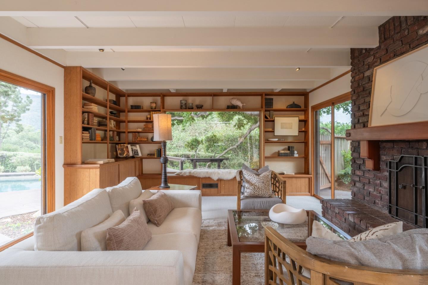 46 Middle Canyon Road Carmel Valley, CA 93924 - Photo 21 of 74 a living room with fireplace furniture and a large window