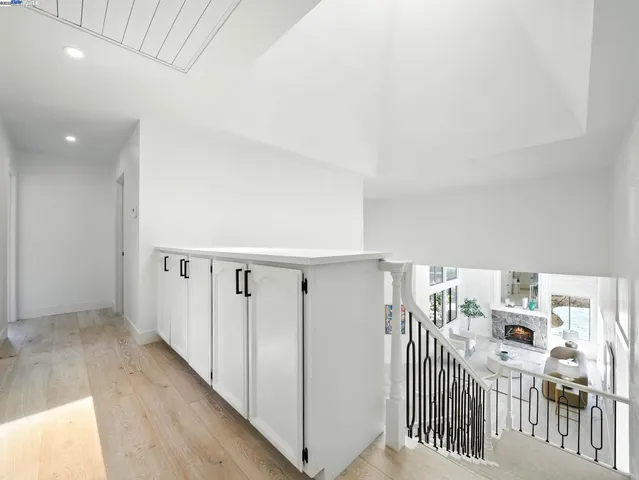 a view of a hallway with a white walls