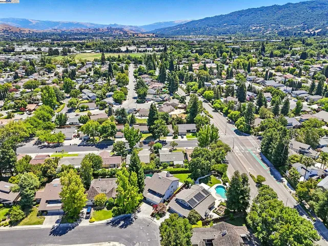 an aerial view of a city with lots of residential buildings