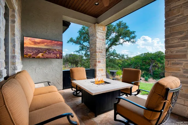 a outdoor living space with furniture and garden view