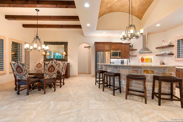 a view of a living room and a balcony