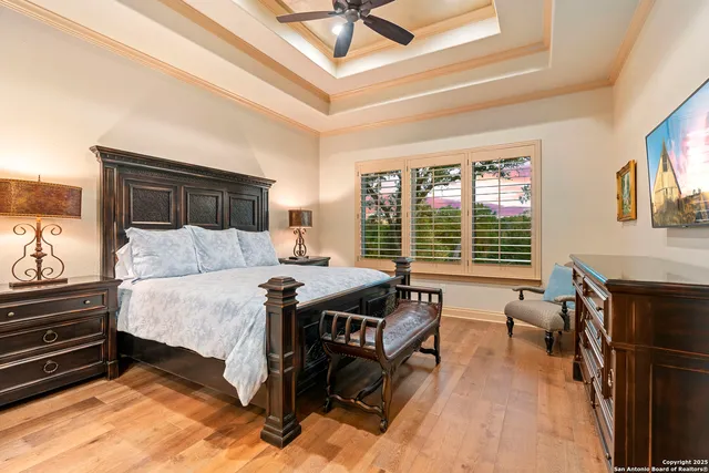 a bed room with a bed and a chair