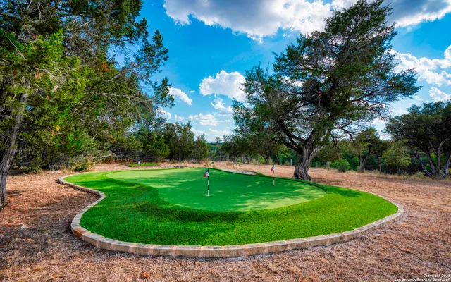 a view of a golf course with a garden