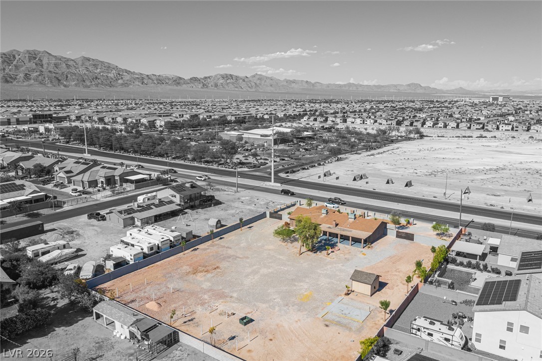 7041 North Decatur Boulevard Las Vegas, NV 89131 - Photo 26 of 33 A spacious lot offering versatile outdoor opportunities, complete with a shed and clear mountain views.
