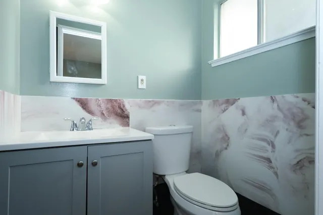 a bathroom with a sink and a toilet