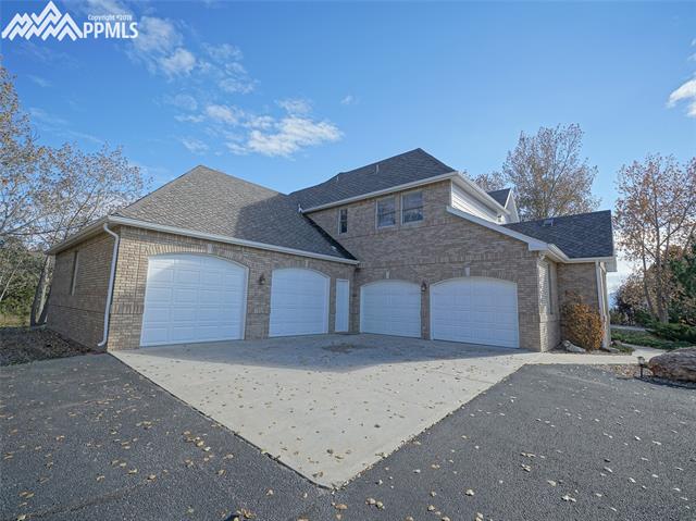 18620 Lower Lake Road Monument, CO 80132 - Photo 2 of 6 Over 1300 sq. feet of garage space with lots of extra parking space.