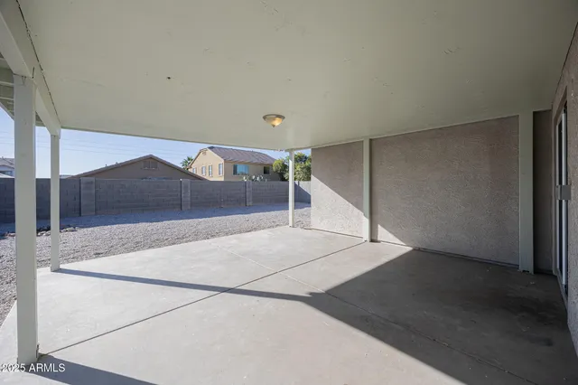 a view of a hallway with staircase
