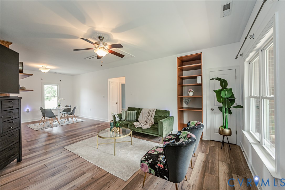 2018 Valentine Road Henrico, VA 23228 - Photo 18 of 65 a living room with furniture and a large window