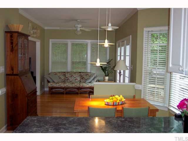 10013 Kilnstone Lane Raleigh, NC 27613 - Photo 4 of 12 a view of swimming pool from a living room