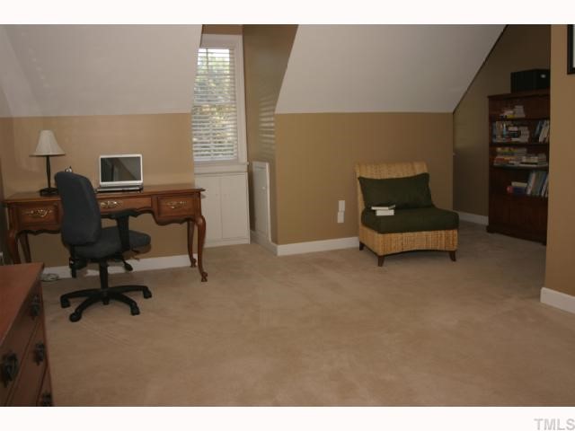 10013 Kilnstone Lane Raleigh, NC 27613 - Photo 10 of 12 a view of a workspace with furniture