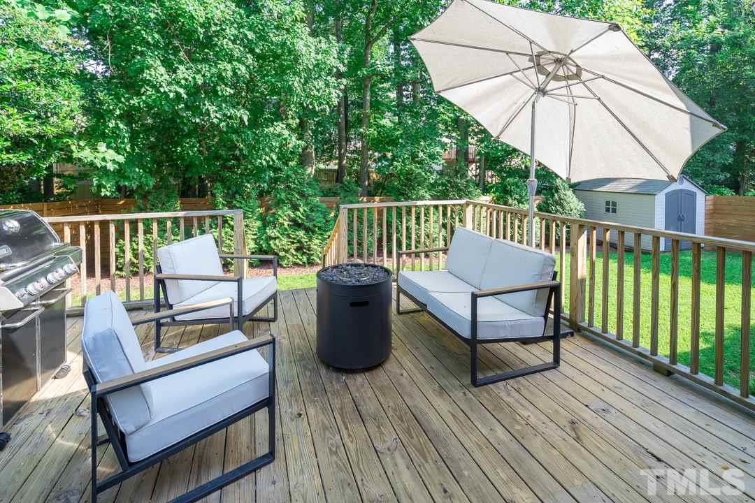 2433 Village Grove Road Raleigh, NC 27613 - Photo 21 of 24 a view of a two chairs in the deck