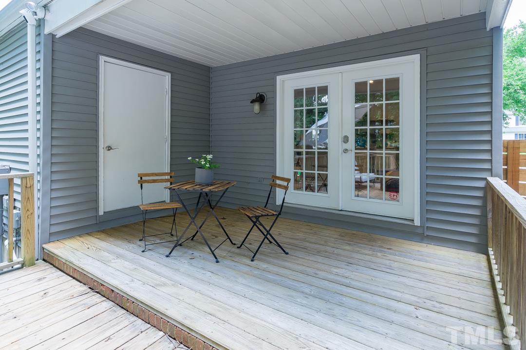 2433 Village Grove Road Raleigh, NC 27613 - Photo 23 of 24 a house view with a seating space