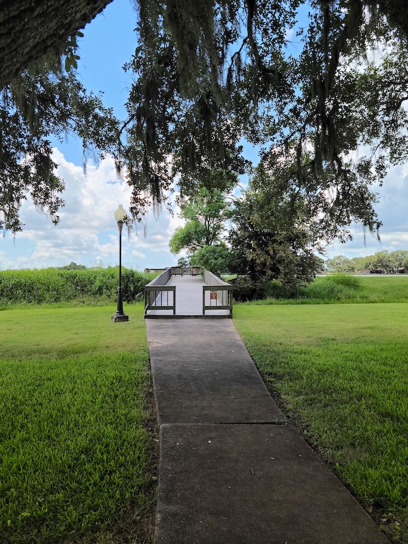 Lot 46 Brahman Trail Angleton, TX 77515 - Photo 10 of 15 a view of a road with a house in the background