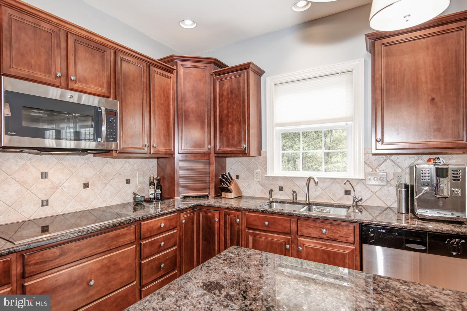 Cherry Cabinetry and Granite Counters