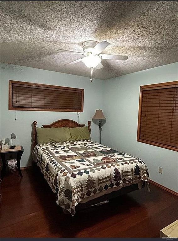 402 Jupiter Street Mission, TX 78572 - Photo 18 of 27 a bedroom with bed and window