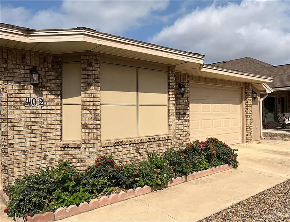 402 Jupiter Street Mission, TX 78572 - Photo 3 of 27 a view of a house with a small entryway
