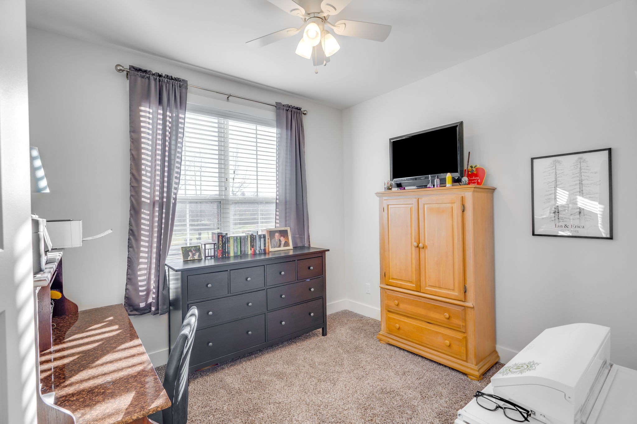609 Womack Road Bethpage, TN 37022 - Photo 11 of 14 a room with furniture and a flat screen tv