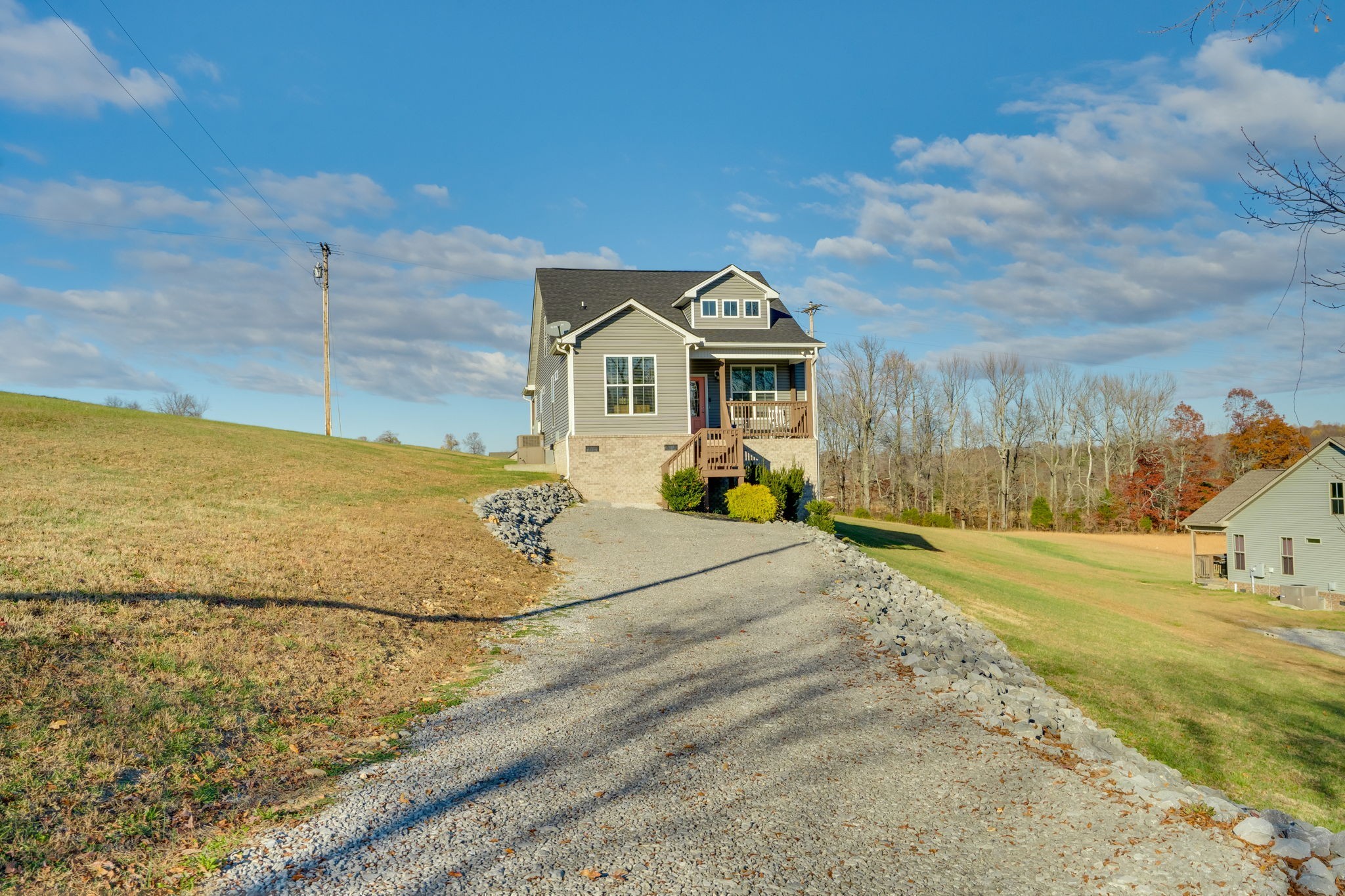 609 Womack Road Bethpage, TN 37022 - Photo 3 of 14 a view of a house with a yard