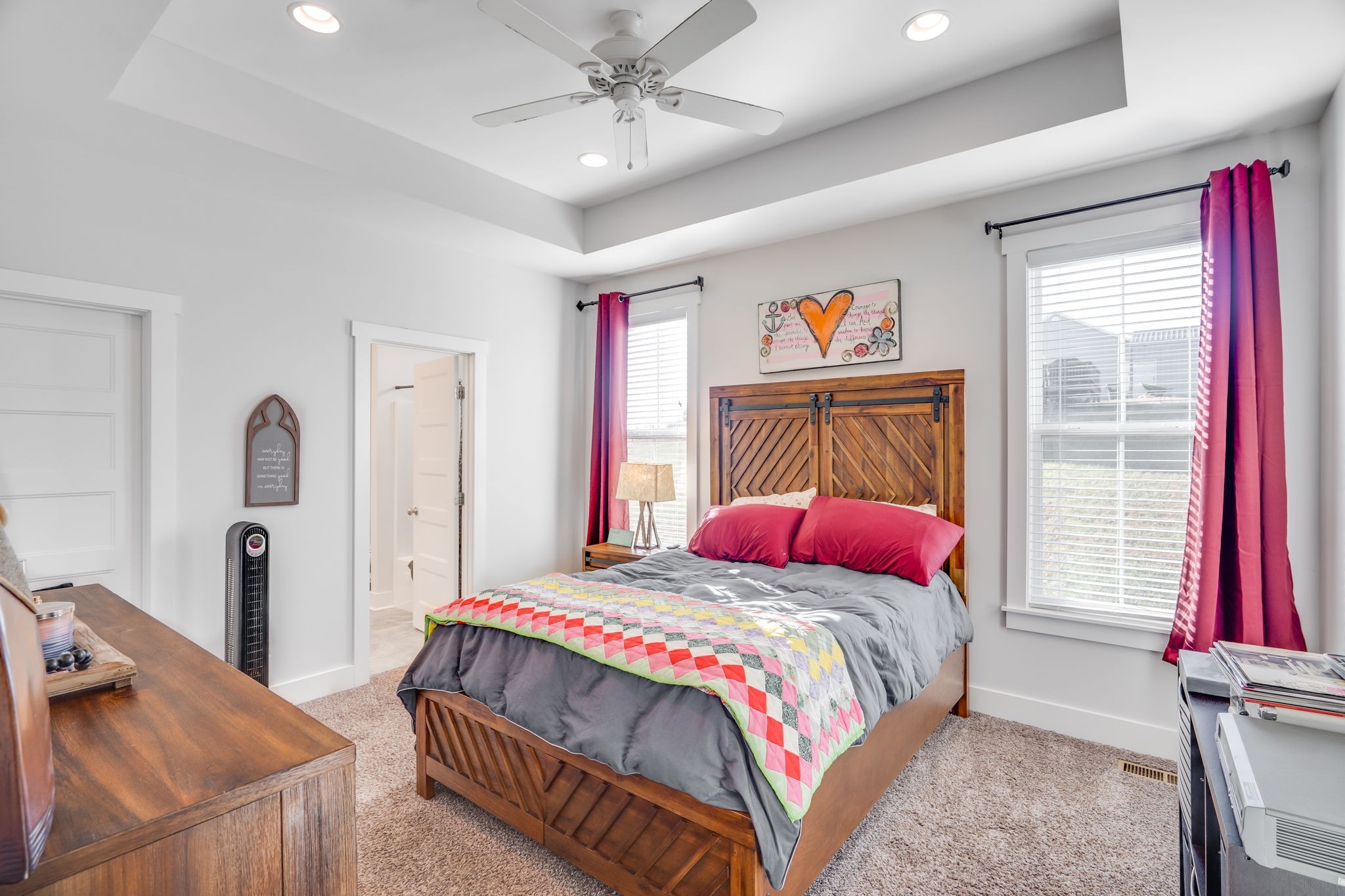 609 Womack Road Bethpage, TN 37022 - Photo 9 of 14 a bedroom with a bed and a painting on the wall