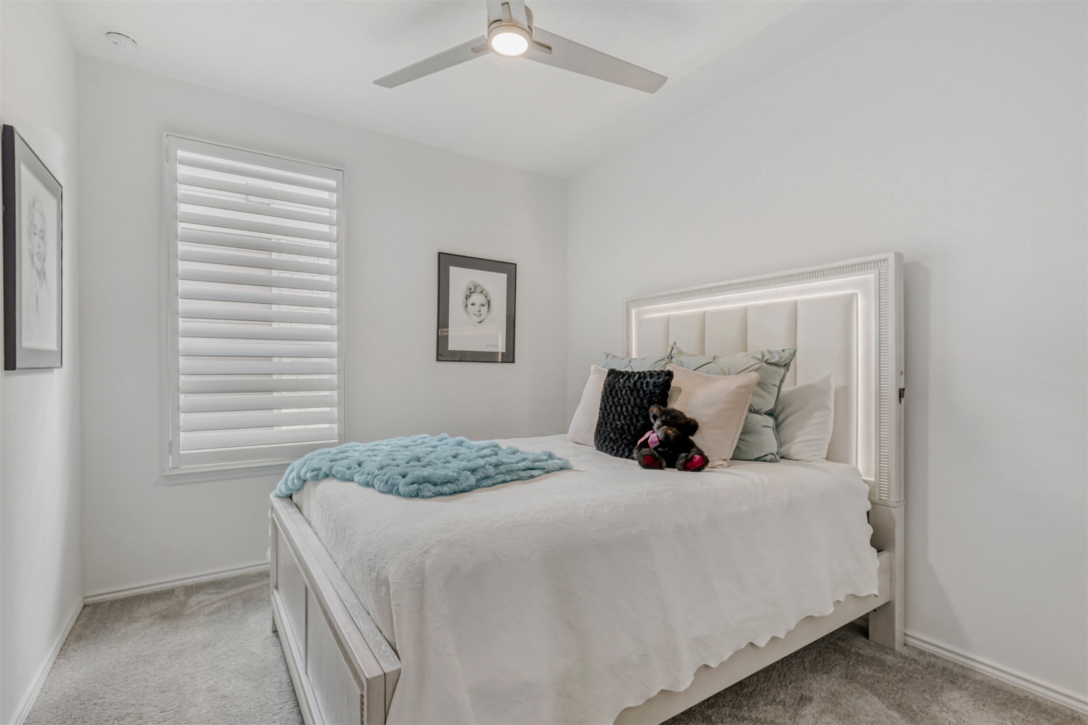 126 Clay Hl Street Georgetown, TX 78633 - Photo 14 of 20 Carpeted bedroom with a ceiling fan and baseboards