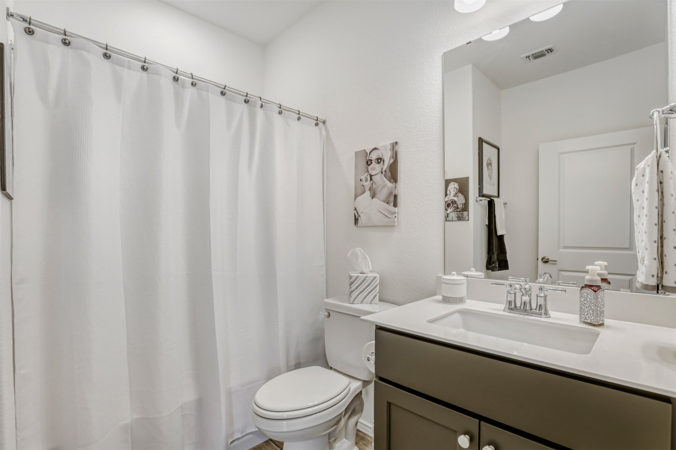 126 Clay Hl Street Georgetown, TX 78633 - Photo 16 of 20 Bathroom with vanity and a shower
