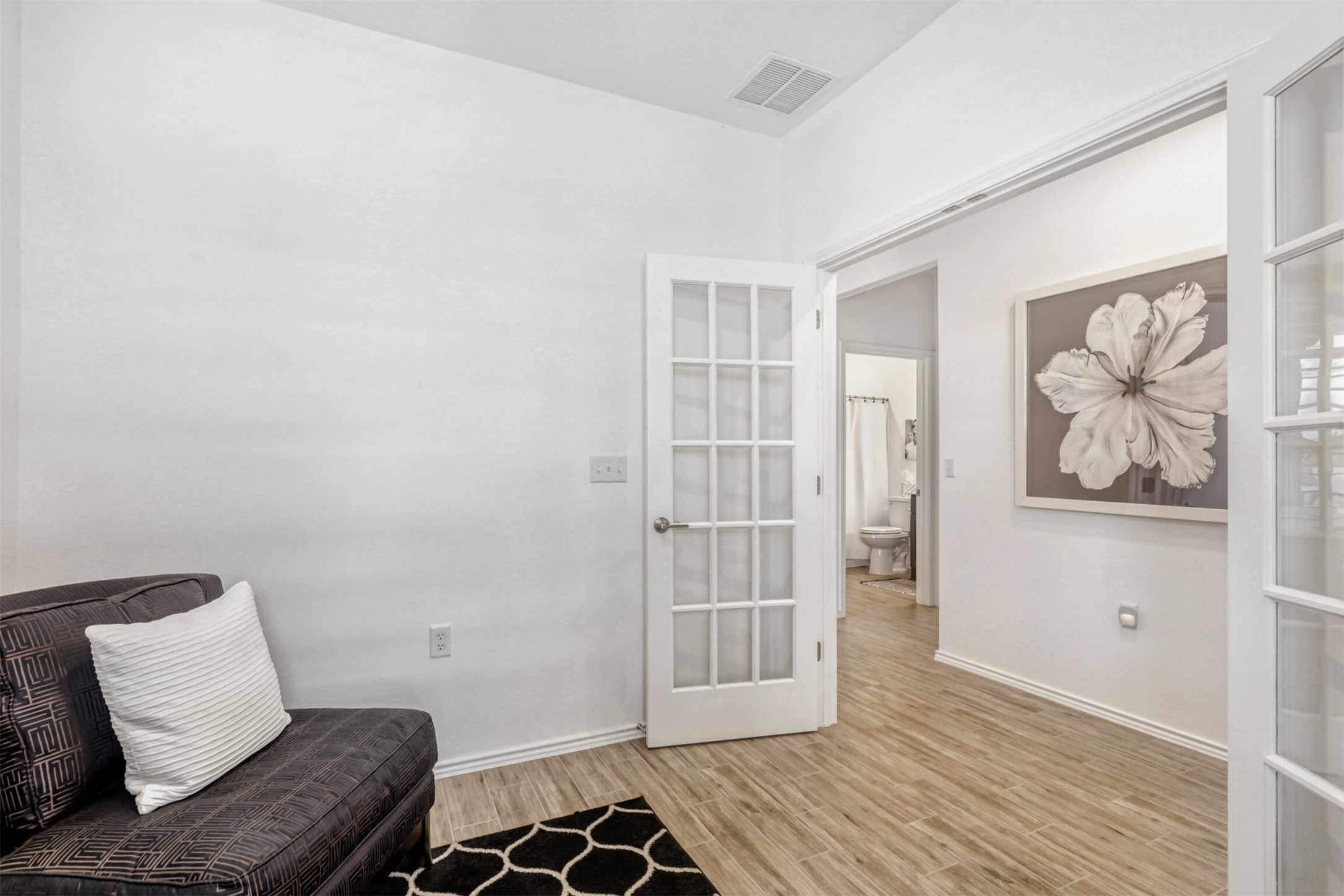 126 Clay Hl Street Georgetown, TX 78633 - Photo 4 of 20 Sitting room featuring light wood-style floors and french doors