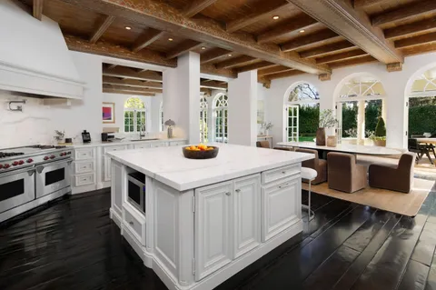 a kitchen with a stove and a sink