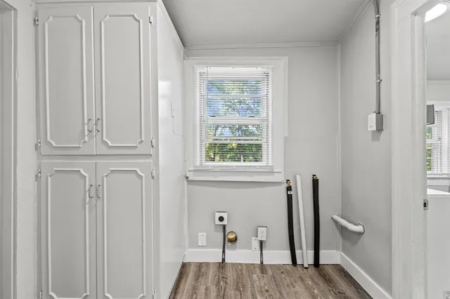 a view of entryway with wooden floor