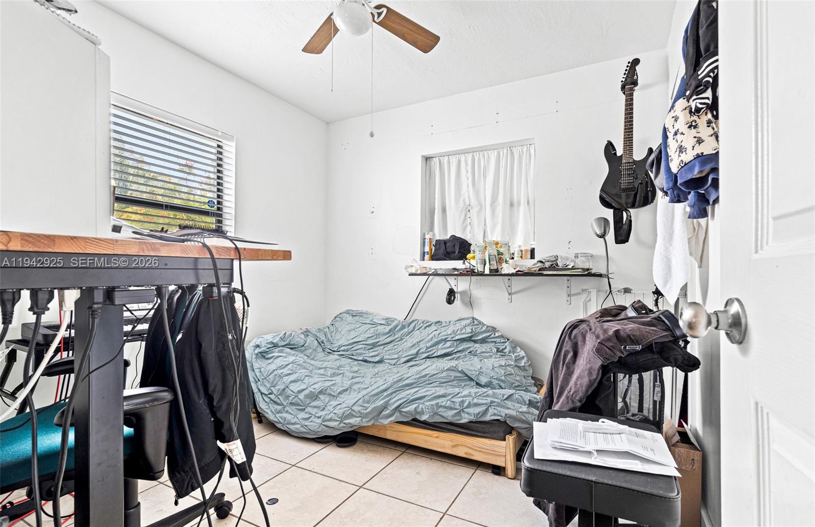 5844 Garfield Street Hollywood, FL 33021 - Photo 21 of 31 a living room with furniture and a window