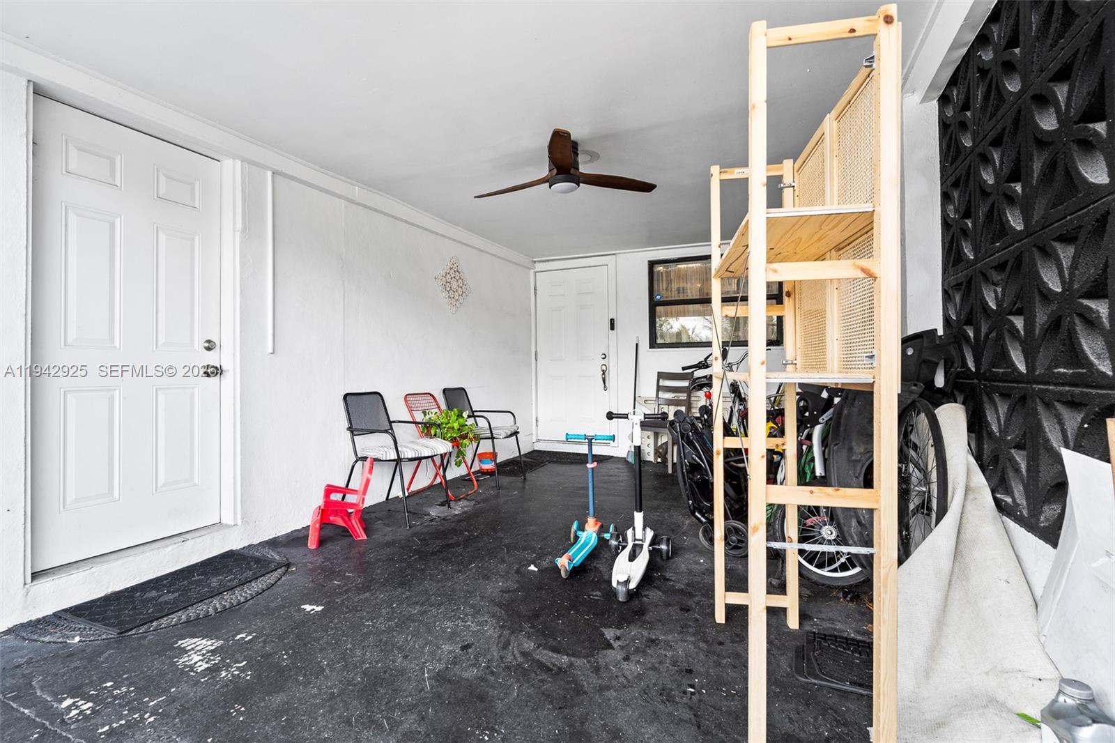 5844 Garfield Street Hollywood, FL 33021 - Photo 23 of 31 a view of a room with gym equipment