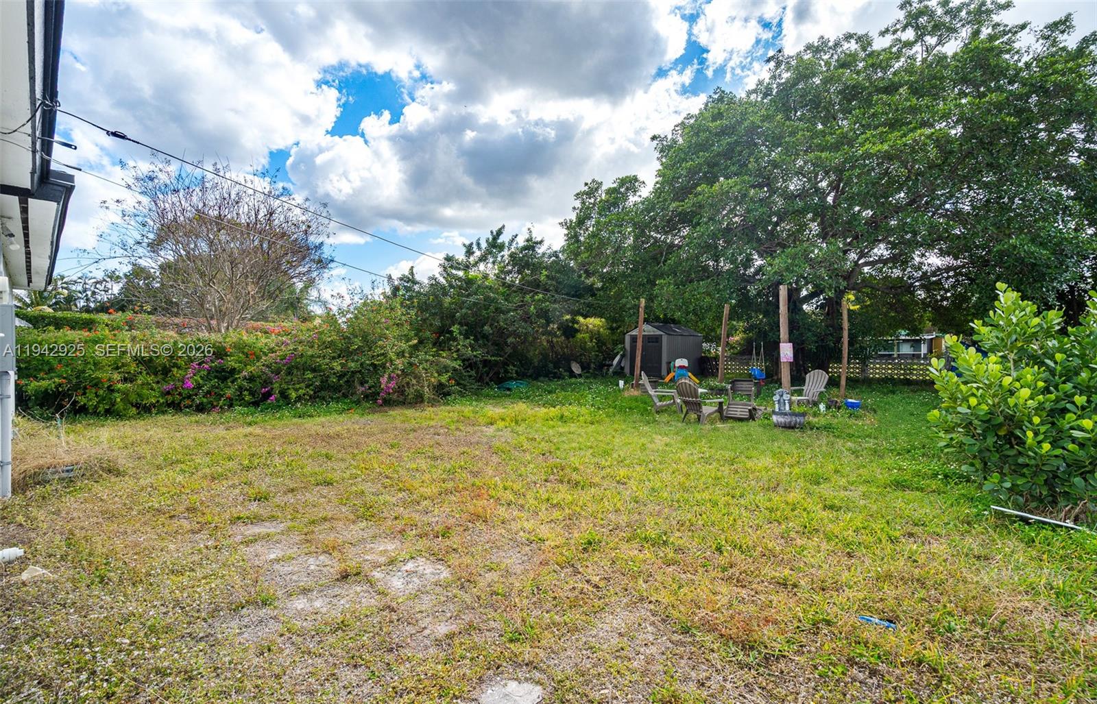 5844 Garfield Street Hollywood, FL 33021 - Photo 28 of 31 a view of a yard in front of the house