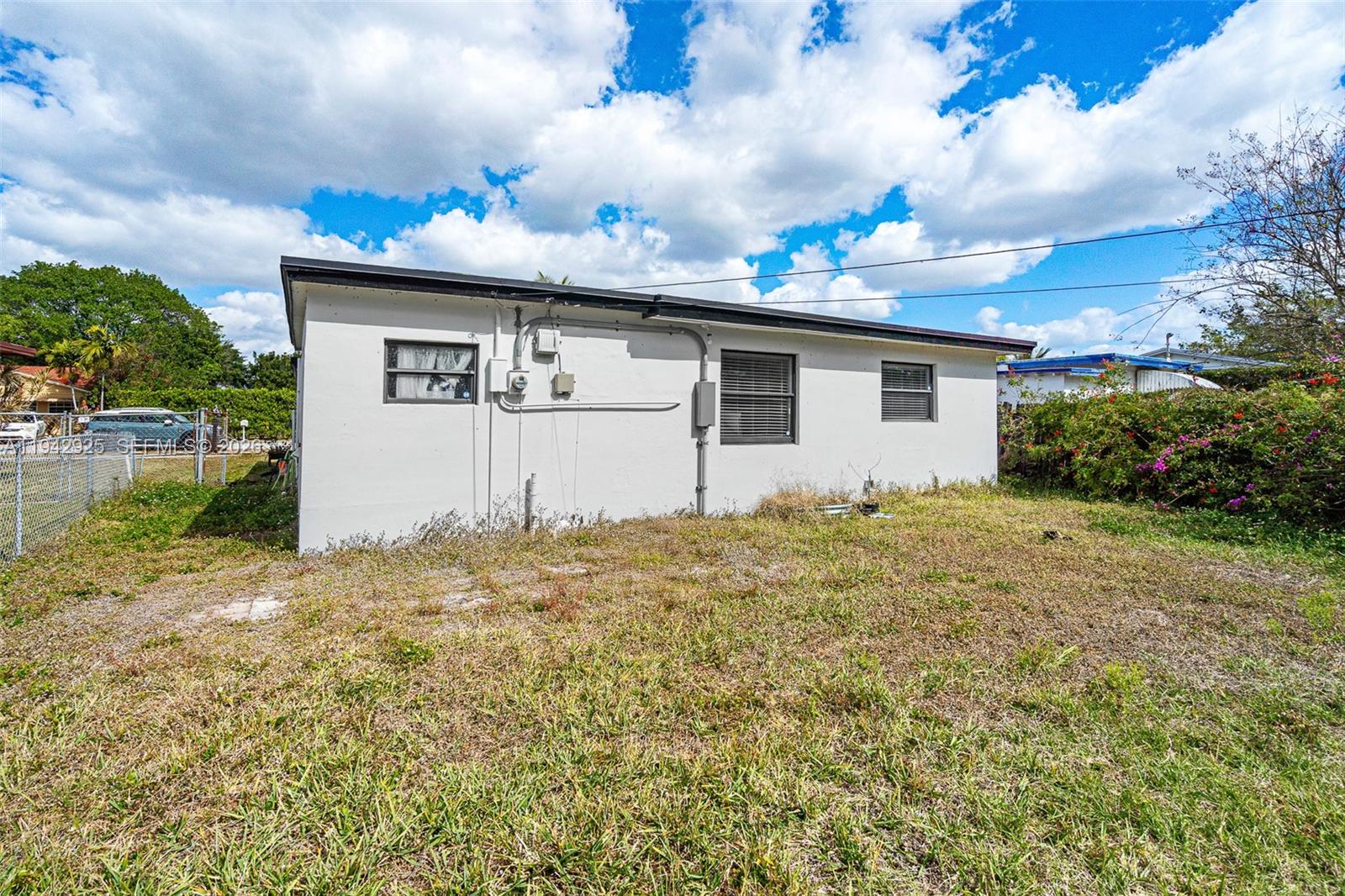 5844 Garfield Street Hollywood, FL 33021 - Photo 29 of 31 a bathroom with a sink and a yard