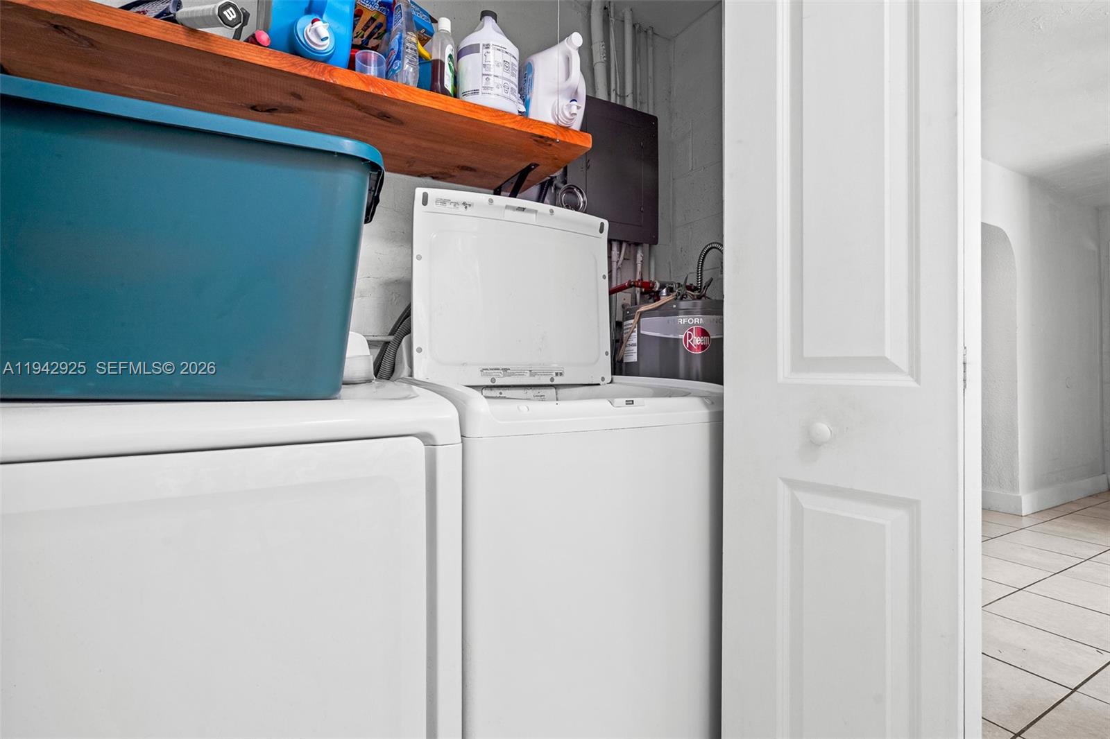 5844 Garfield Street Hollywood, FL 33021 - Photo 7 of 31 a utility room with dryer and washer