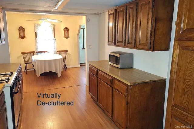 a bathroom with a sink a mirror and a shower