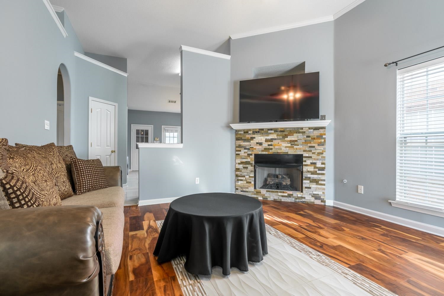 6818 Manslick Road Cordova, TN 38018 - Photo 3 of 23 a living room with furniture and a fireplace