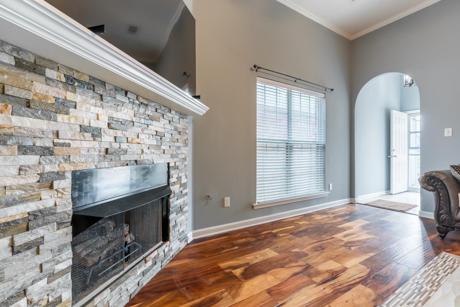 6818 Manslick Road Cordova, TN 38018 - Photo 5 of 23 a bedroom with a bed and a fireplace