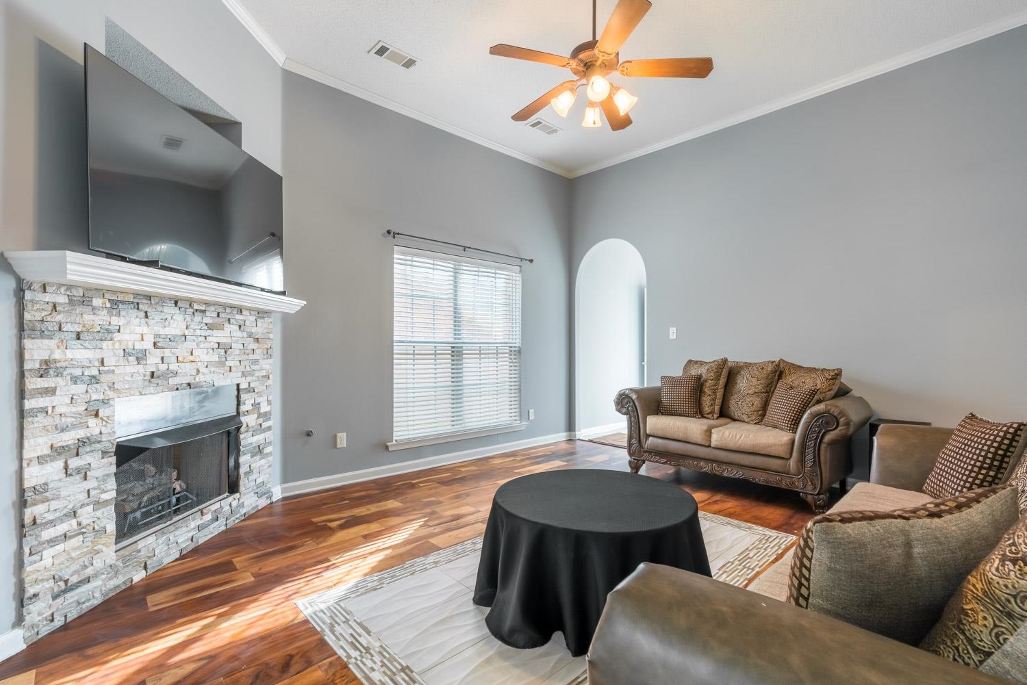 6818 Manslick Road Cordova, TN 38018 - Photo 7 of 23 a living room with furniture and a fireplace