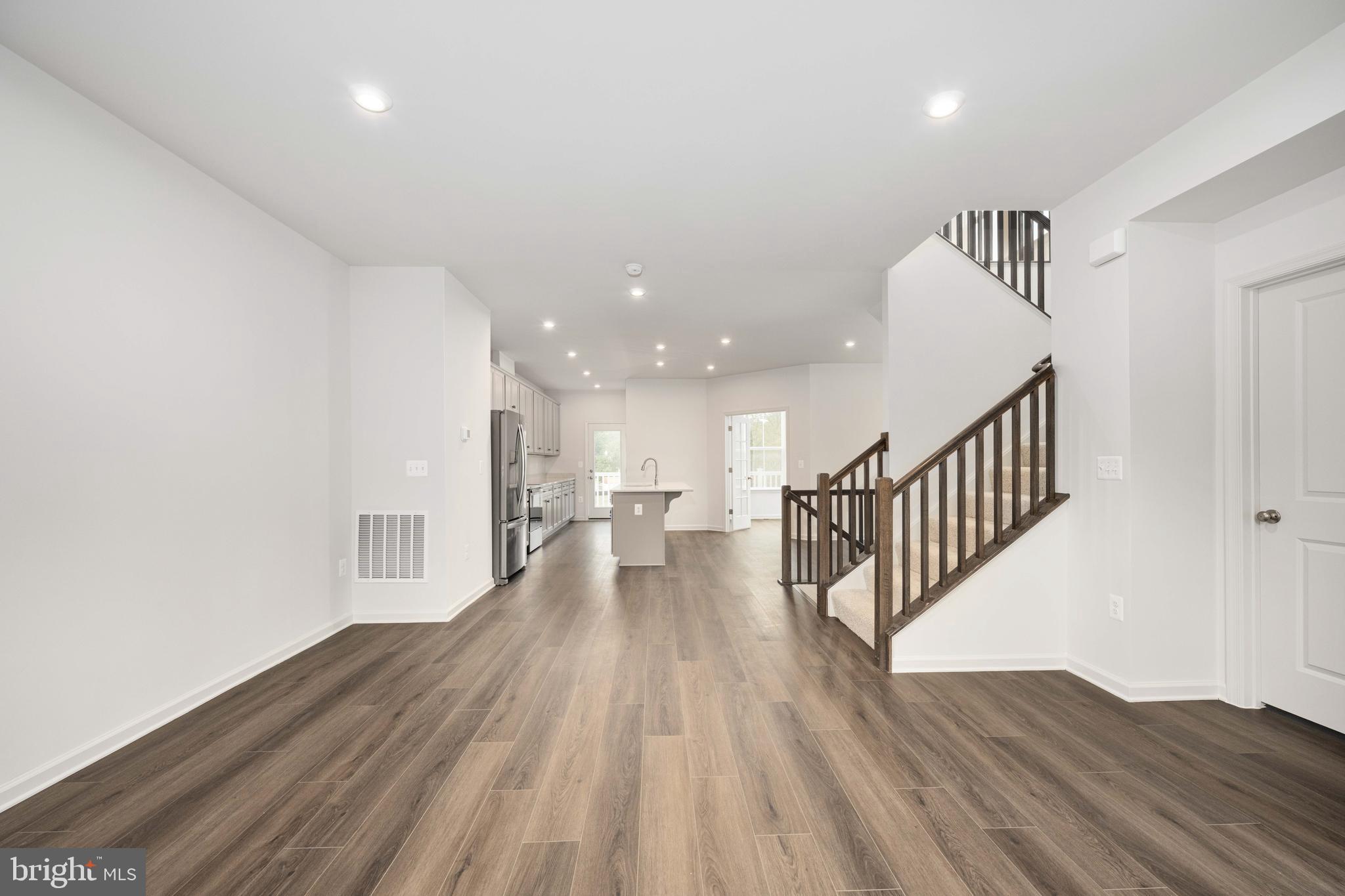 10114 Queens Way Manassas, VA 20110 - Photo 18 of 56 a view of entryway with wooden floor