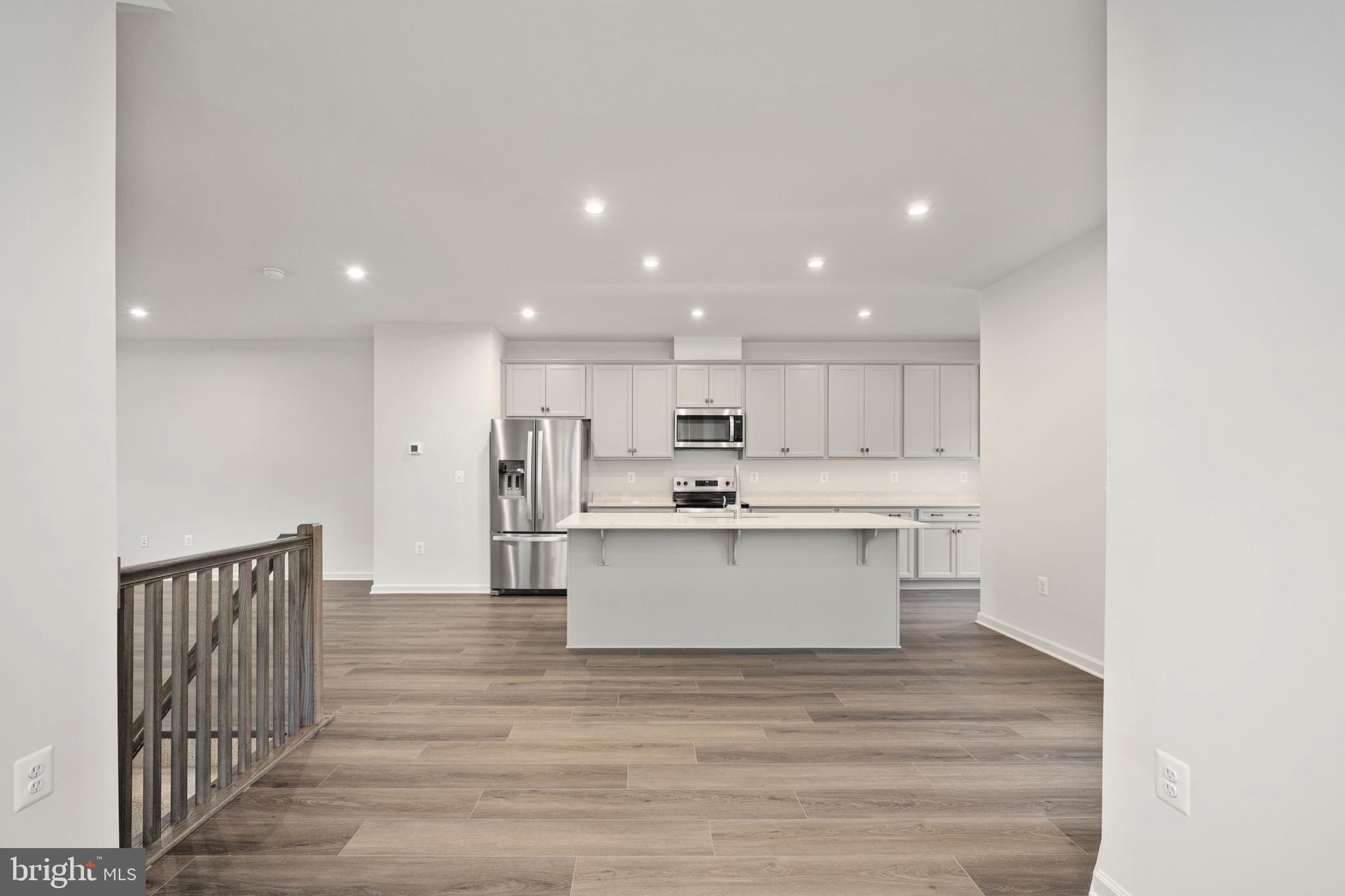 10114 Queens Way Manassas, VA 20110 - Photo 23 of 56 a view of kitchen with wooden floor