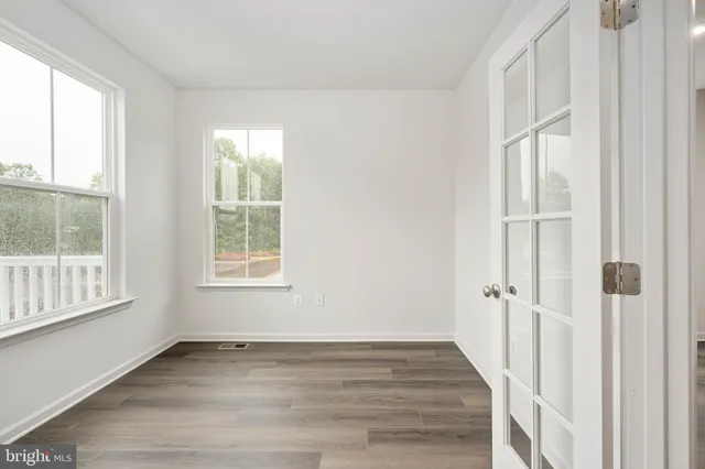 a view of a hallway with a natural light