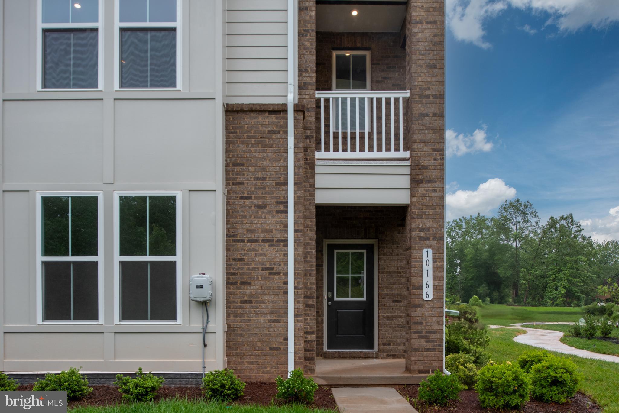 10114 Queens Way Manassas, VA 20110 - Photo 3 of 56 a view of front door of house