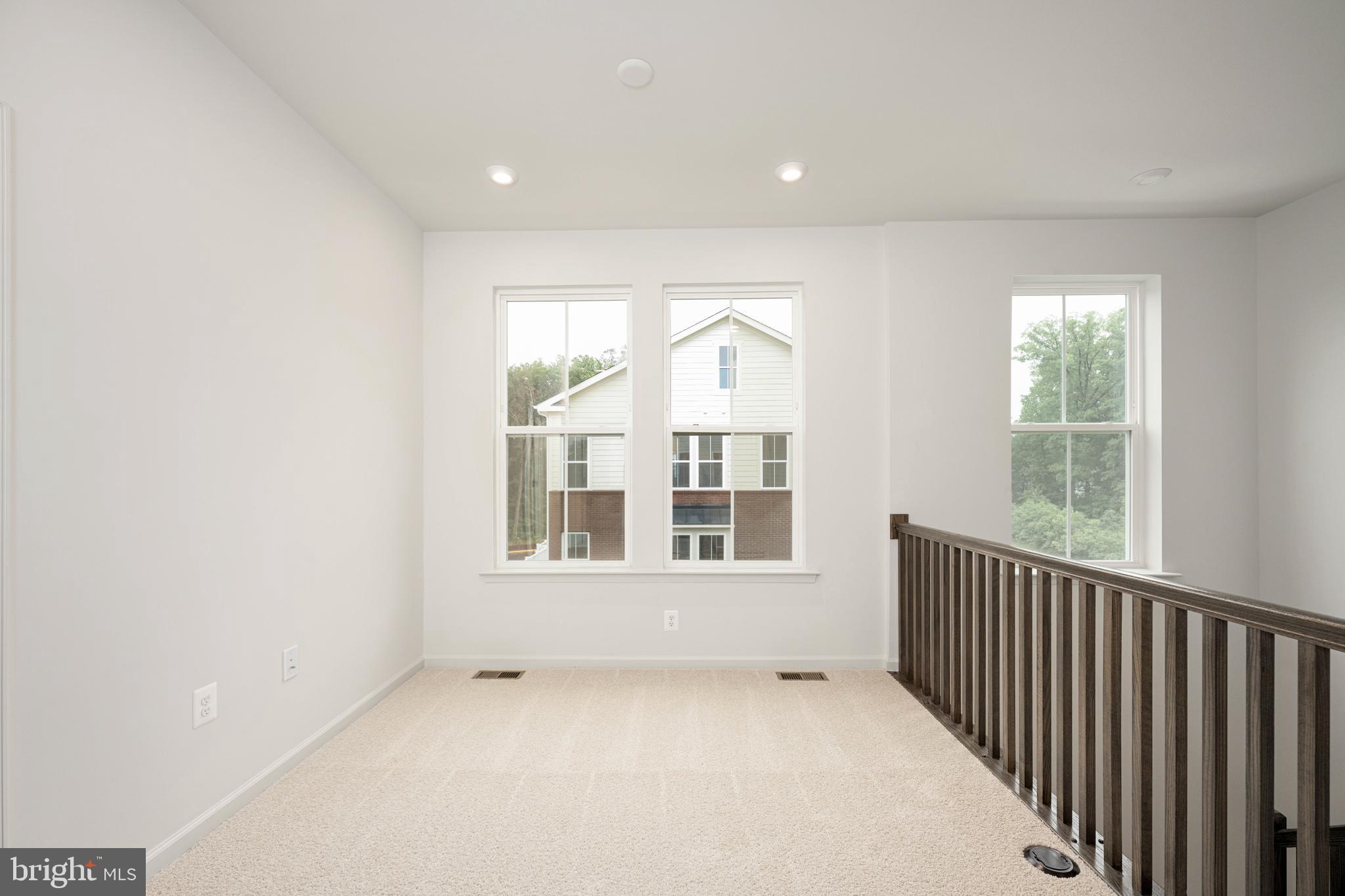 10114 Queens Way Manassas, VA 20110 - Photo 35 of 56 a view of an empty room with a window