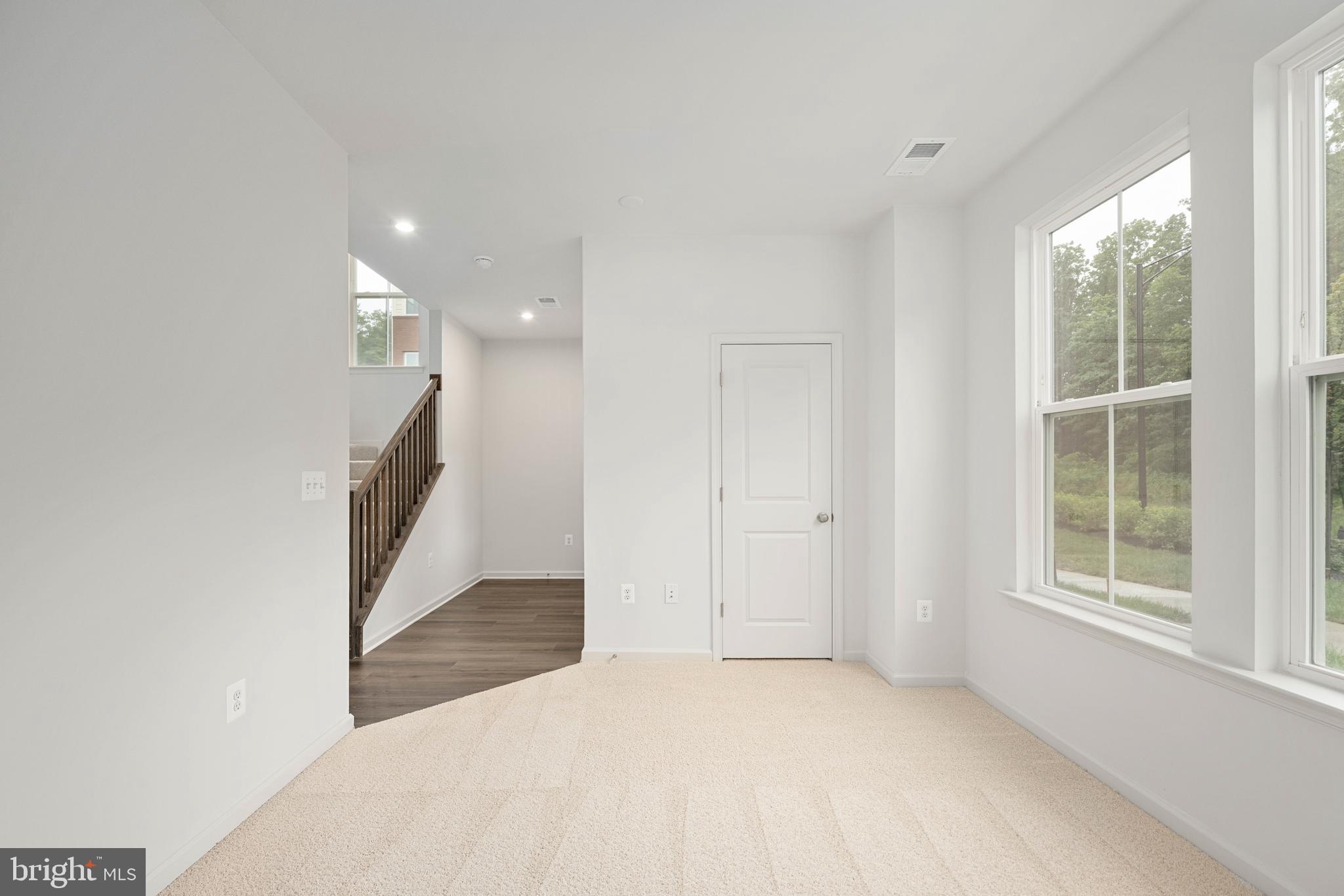 10114 Queens Way Manassas, VA 20110 - Photo 42 of 56 a view of a hallway with windows