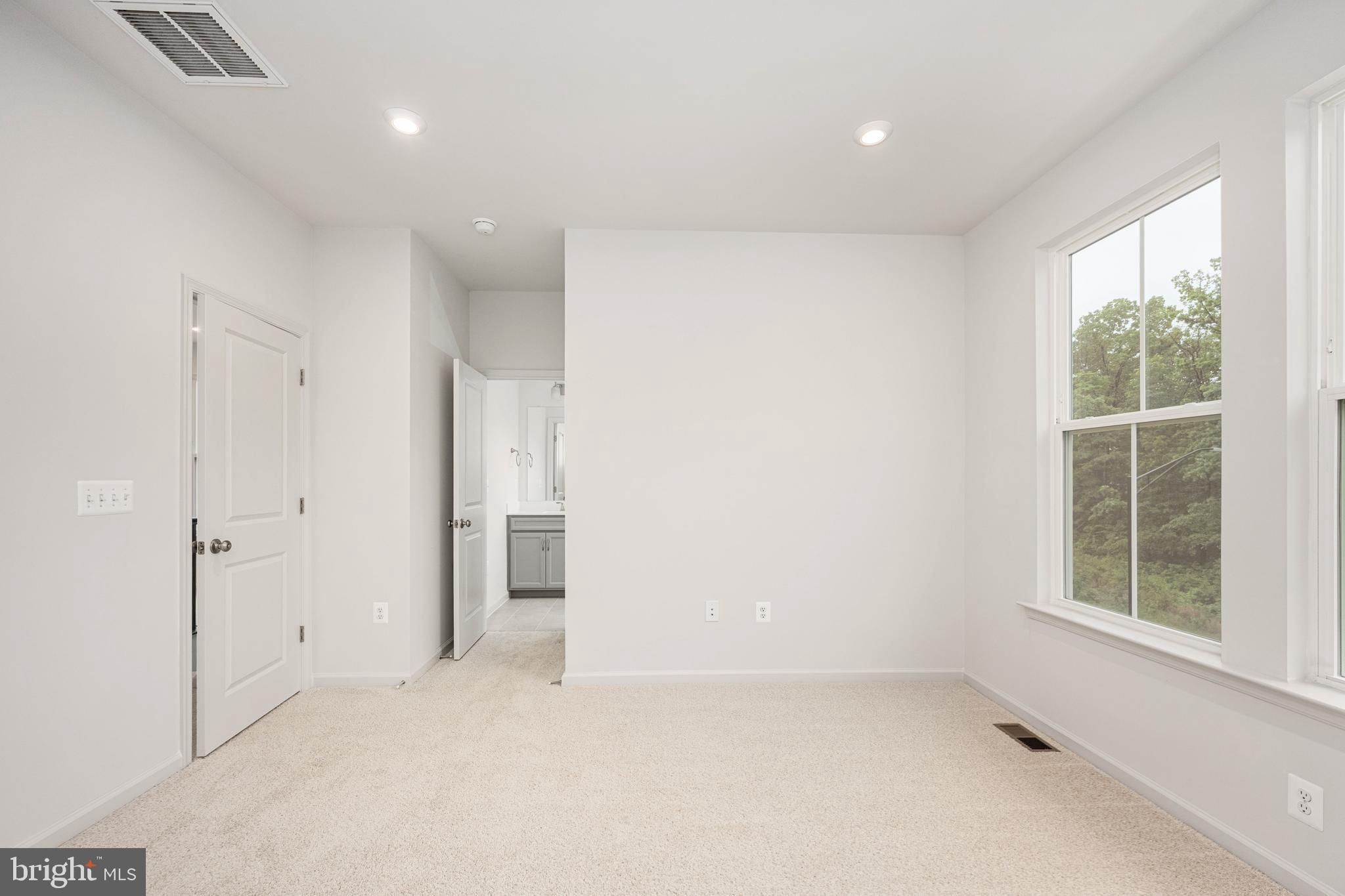 10114 Queens Way Manassas, VA 20110 - Photo 47 of 56 a view of an empty room with a window
