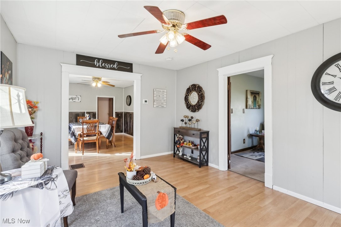 3511 Austin Road Geneva, OH 44041 - Photo 6 of 37 Living room with hardwood / wood-style flooring and ceiling fan