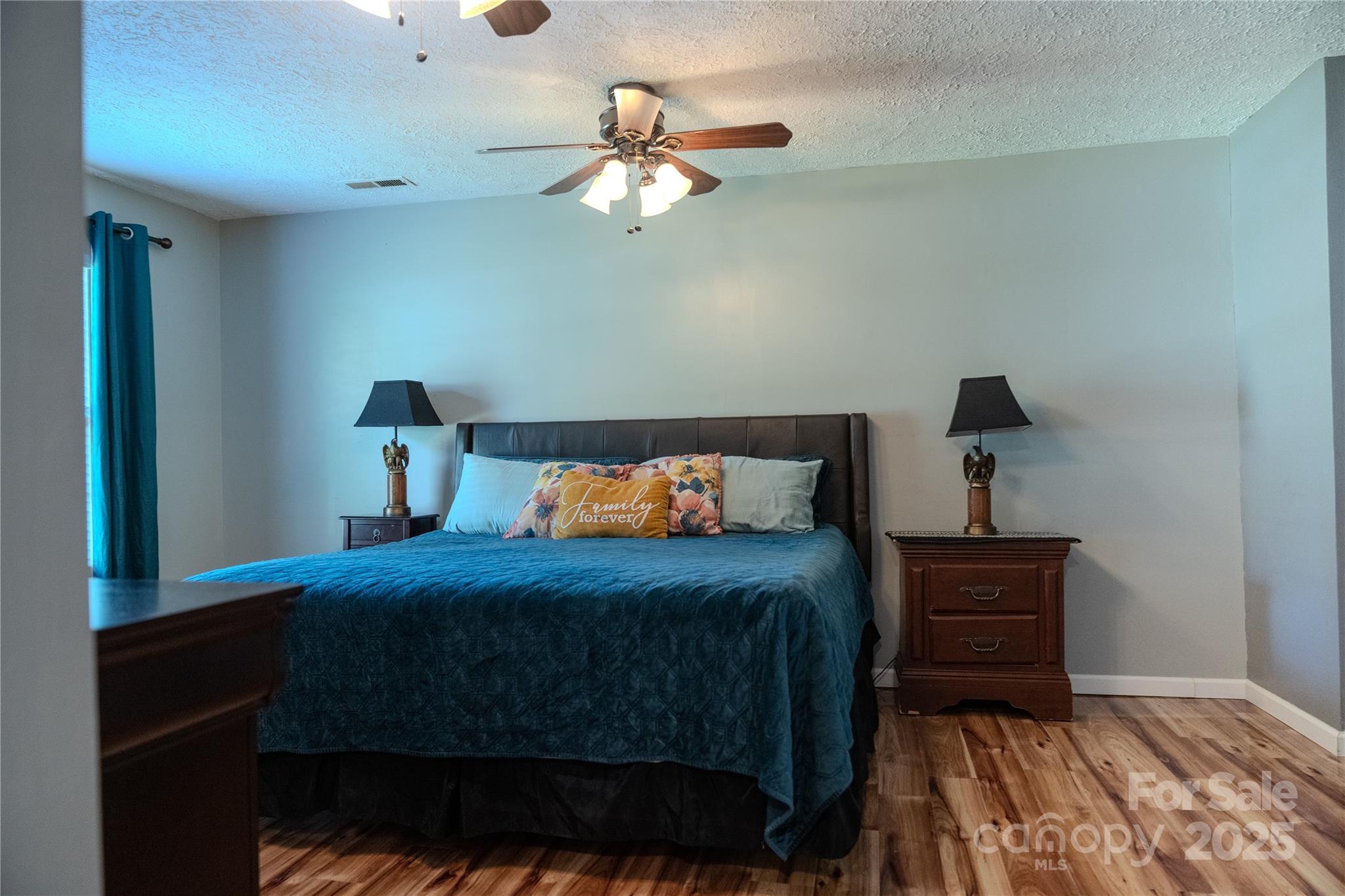 514 King Road Flat Rock, NC 28731 - Photo 21 of 47 a bedroom with a bed and a dresser