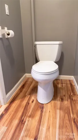 a bathroom with a toilet and a sink