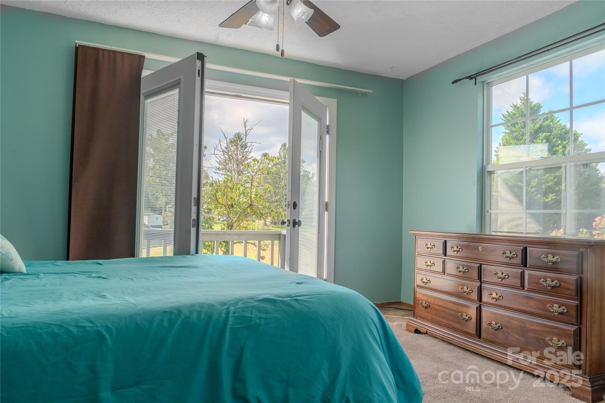 514 King Road Flat Rock, NC 28731 - Photo 31 of 47 a bedroom with a bed and a window