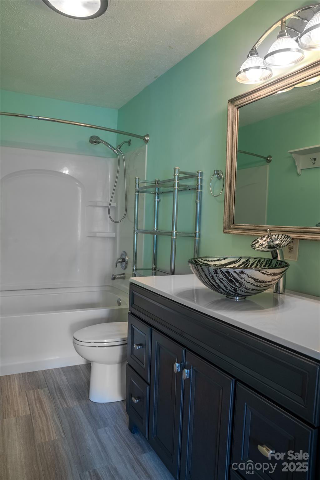 514 King Road Flat Rock, NC 28731 - Photo 36 of 47 a bathroom with a sink a toilet and shower