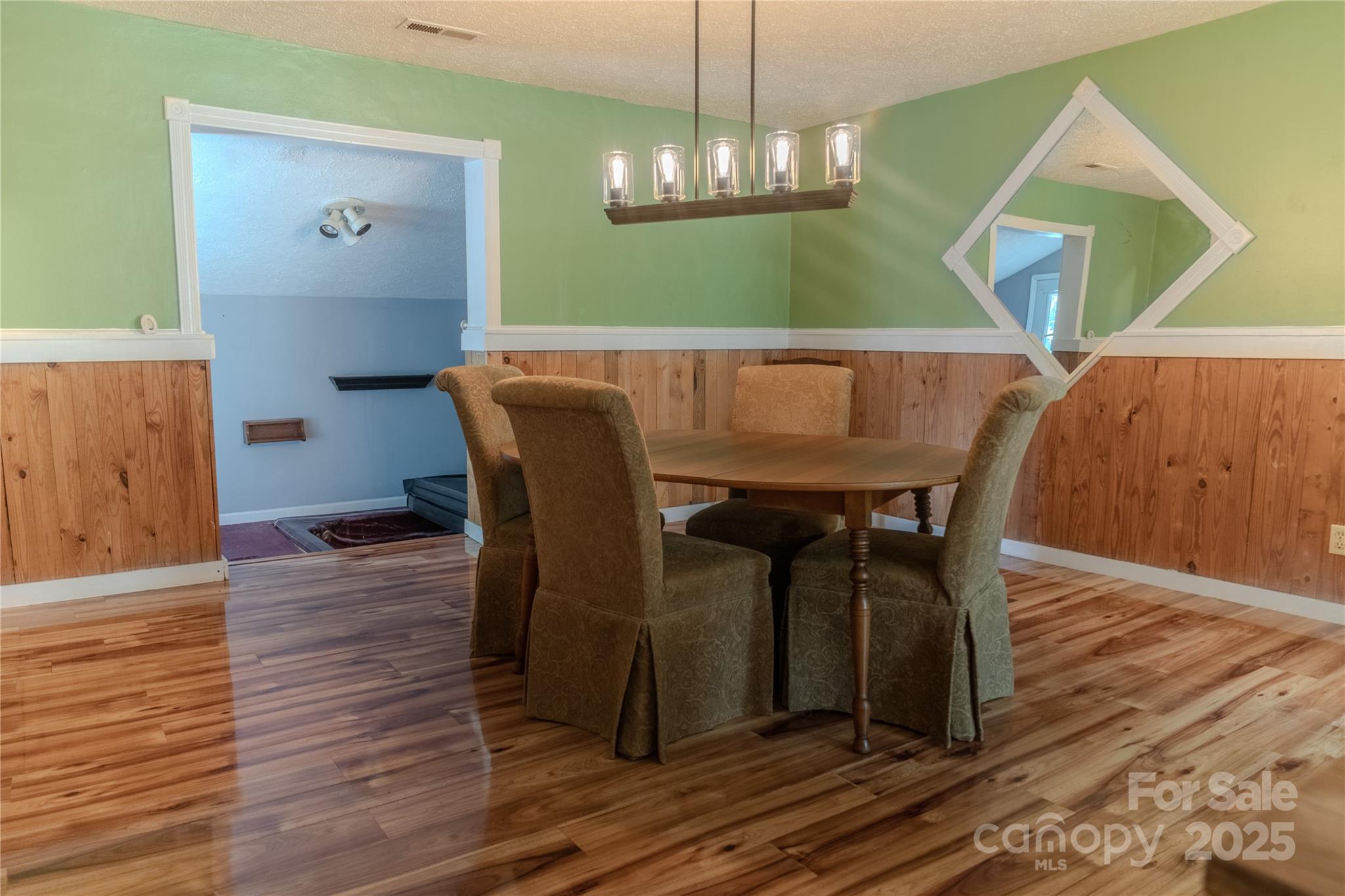 514 King Road Flat Rock, NC 28731 - Photo 38 of 47 a view of a dining room with furniture and wooden floor